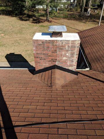 After Ms. B had the issues handle resolved that we could not help her with we re-flashed her chimney!