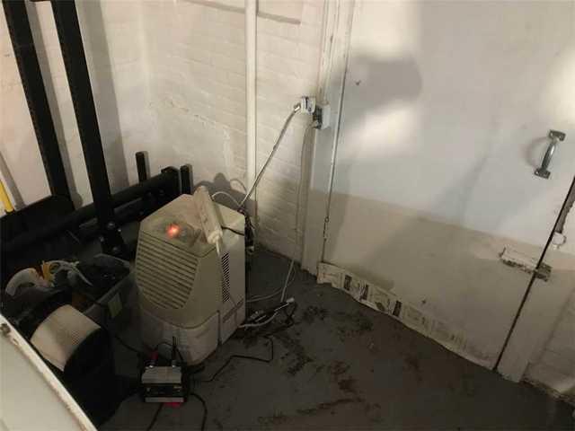 The existing dehumidifier could not handle the amount of moisture that was inside this large side basement causing that musty odor to roam the entire space.