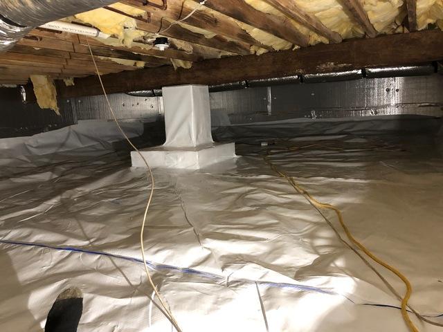 We have installed the CleanSpace liner in this crawl space and wrapped the piers, as you can see in this picture.