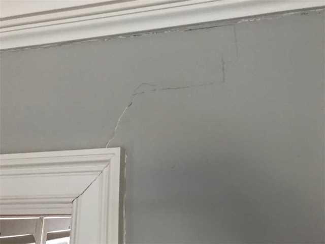 Above the door frame, there was a crack.