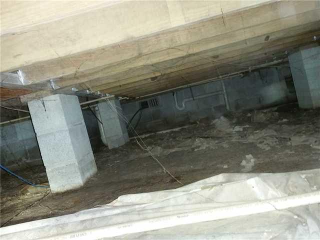A failing vapor barrier had to be removed.