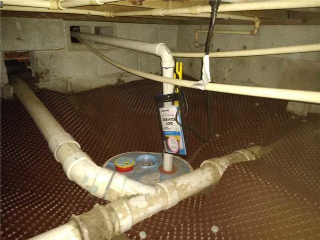 A SuperSump pump was installed to pump the water away.