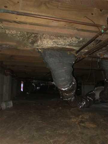 The crawl space needed to be completely encapsulated before someone fell through the floor.