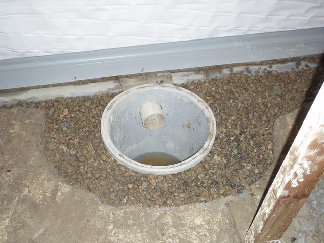 Our SuperSump sump pump is economical and effective. It gets the job done, and was installed in this Lake Stevens basement along with our WaterGuard piping system and inspection port, our UltraSump battery back-up pump, and our CleanSpace wall system.