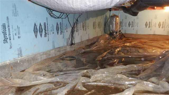 With little vapor barrier in place, as well as the lack of a dehumidifier, this crawlspace is unhealthy and losing money.