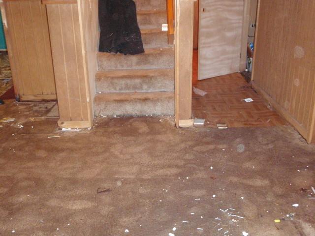 The carpet and floors in this Lake Stevens basement were sopping wet and reeked. But Rainy Day Basement Systems can waterproof any basement. At this house, we installed our WaterGuard piping system and inspection port, our SuperSump sump pump with the UltraSump battery back-up pump, and our CleanSpace wall system.