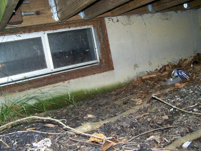 The outside of this basement window is rusty, allowing water into the basement. We would recommend our EverLast window, which are made of vinyl and include insulated glass. 