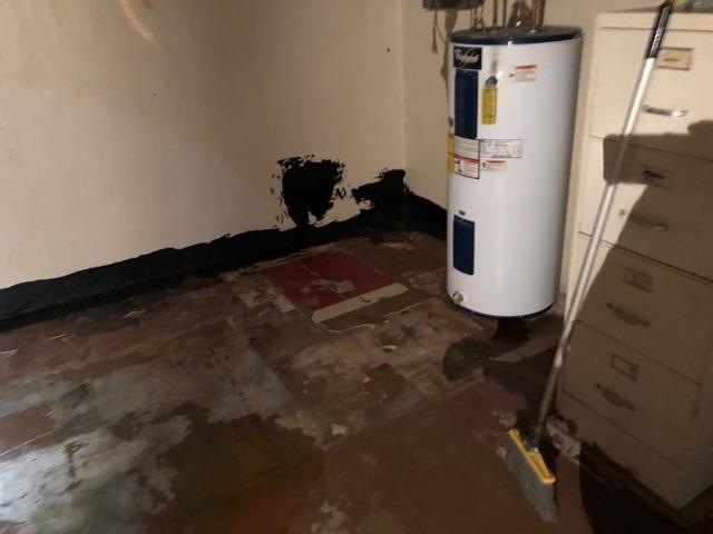 Corner of basement with water