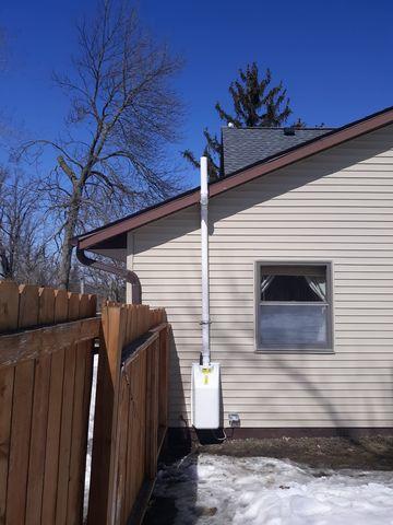 A fan is installed to ensure the radon gas is pushed up and out. We covered the fan for aesthetic purposes.