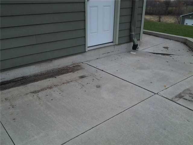 American Waterworks can quickly and effectively repair this driveway and walkway by leveling the concrete, rather than tearing out and replacing it.