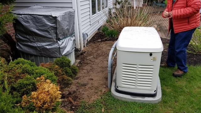 This 16kw Generac generator is very compact. So much so, it is almost smaller than the outdoor air conditioning coil it sits next to in the yard.