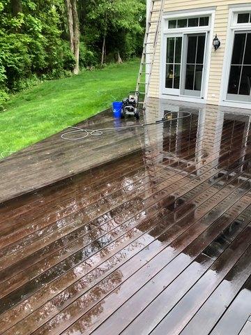 Midway through our power wash of this deck.