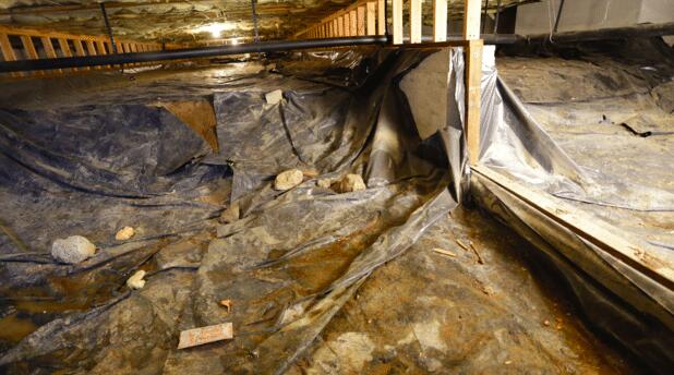 The crawl space had repeated flooding and a mold problem.