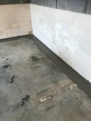 The concrete is drying after the installation of the WaterGuard.