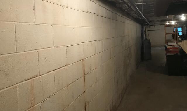 The basement suffered from water damage from repeated flooding.