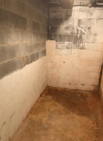 The basement suffered from water damage from repeated flooding.