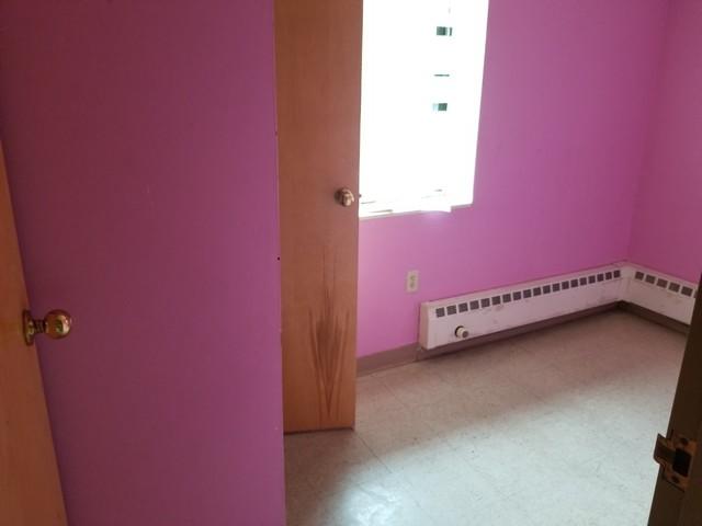 A vibrant pick was chosen for the interior painting of the bedroom in Chester, CT.