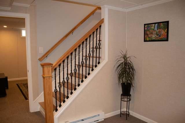 A Finished Basement Hallway and Staircase in Westford, MA