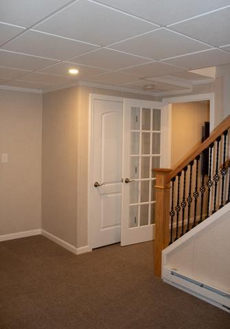 A Finished Basement Hallway and Staircase in Westford, MA