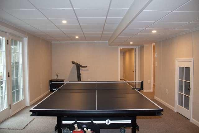 A Finished Basement Game Room and Prayer Room in Westford, MA