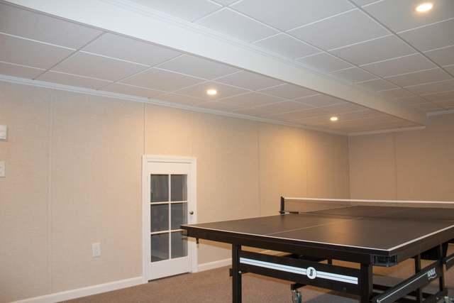 A Finished Basement Game Room and Prayer Room in Westford, MA