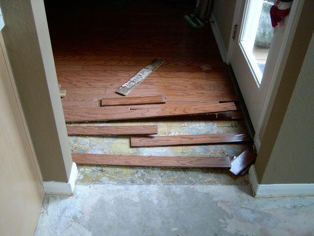 some areas surrounding the kitchen weren't so lucky. causing the removal of hardwood planks (ONLY AFFECTED AREAS).