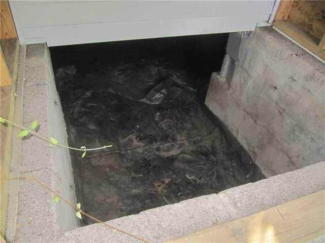 Exposed Entrance to Crawl Space