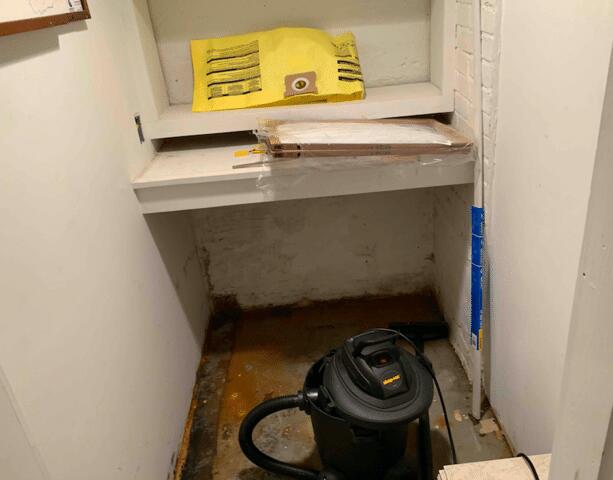 The homeowner had to repeatedly suck up water with a Vacuum because the basement repeatedly flooded.