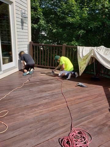 <p>Sanding down areas for the best deck staining results in Middletown, CT</p>