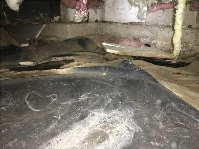 Dirt and water spots on the vapor barrier