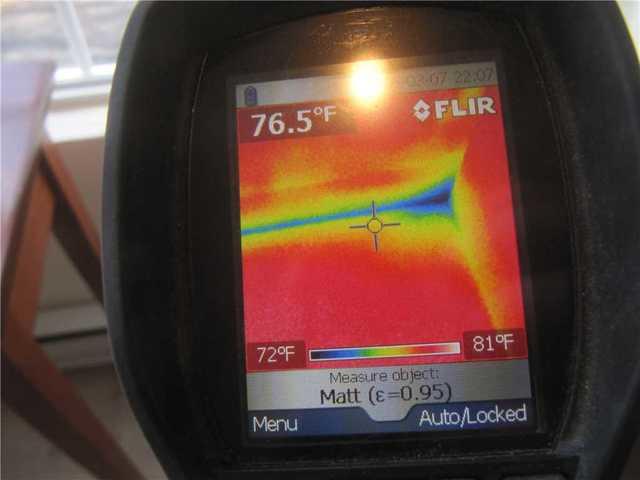 This is another spot on the first floor along the rim joist. The difference between the base board and everything around it is 4.5 degrees, which doesn't seem like much, but in home energy this is a big concern.