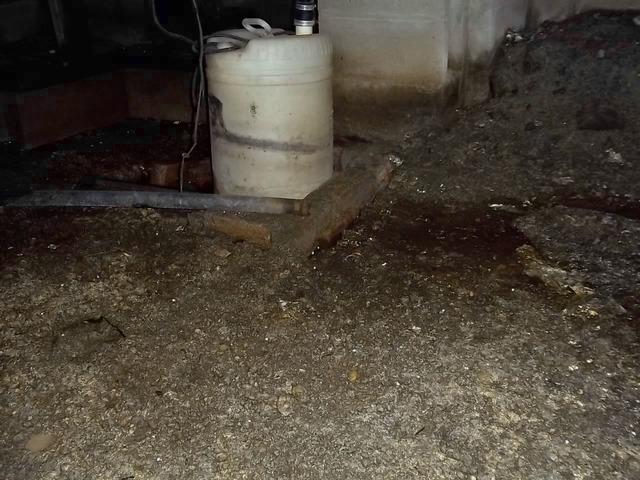 <p>This makeshift sump pump did nothing to push water out of this Armonk, NY crawlspace. In addition to being ineffective, the old sump pump was unsanitary. It allowed dirt and bacteria to sit inside it and evaporate into the air. Our team installed the SuperSump Sump Pump System. It can pump 2220 gallons per hour at a 8-foot discharge head (43gpm) smoothly and quietly.</p>