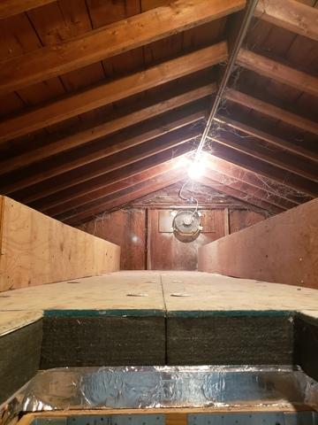 Attic insulation in progress