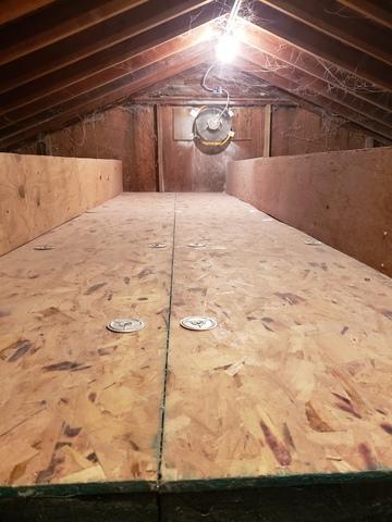 Attic insulation in progress