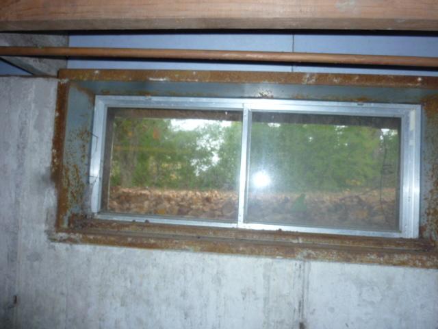 <p>Steel basement windows like this one in Hebron, CT, have a tendency to rust over time and allow water into the home. Our team installed a replacement EverLast window. The new widow features insulated, low-e glass to reduce heat loss and improve energy efficiency. Since it is made of vinyl, it will neither rust or rot.</p>