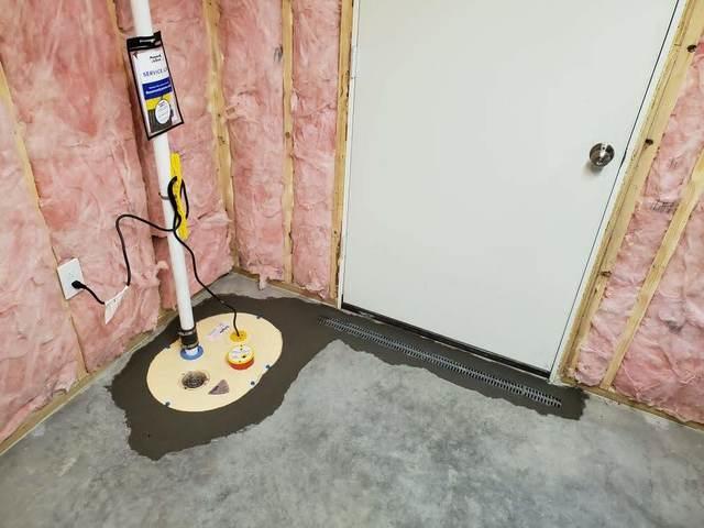 We installed two SuperSump pumps and here is a look at one of them near an entry door. This one we also installed a TrenchLock to protect the radon system's vacuum.