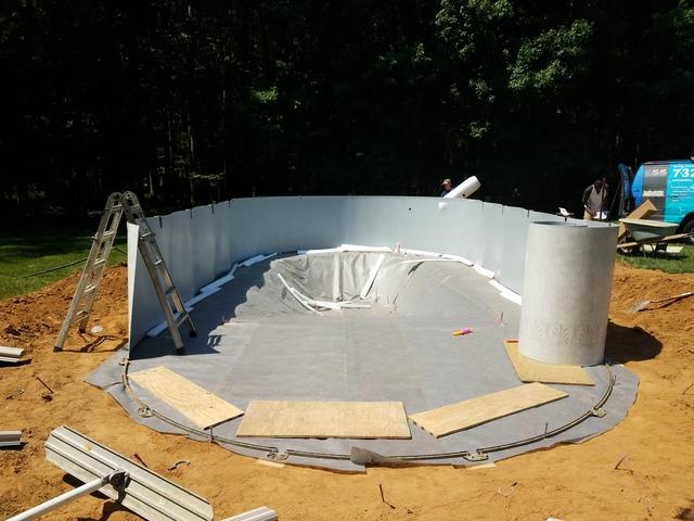 Now that the protective barrier has been laid, the pool walls are ready to go up and sand for the pool floor is ready to be placed.