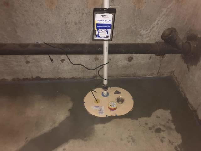 We installed a SuperSump Plus in this Northampton, MA basement to help rid the basement of water seeping into the space