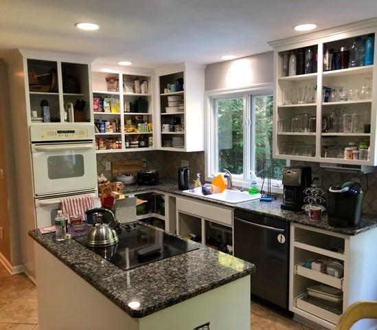 The entire kitchen was painted to match the cabinets for a cohesive look.