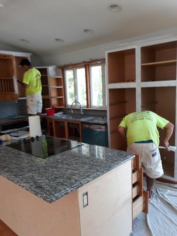 Removing these cabinets so walls are bare and ready for new paint