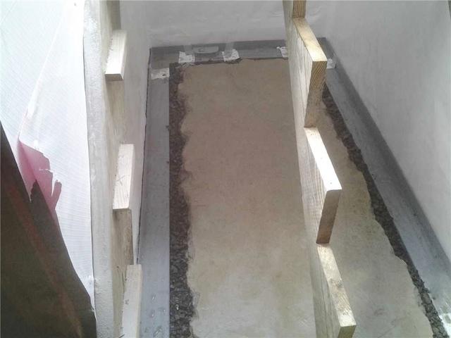 WaterGuard Installs Behind Stairs