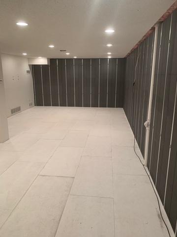 Basement To Beautiful Panels and Insulated Floor Decking