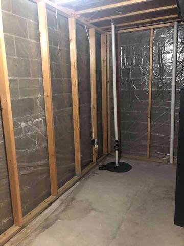 Before Basement Waterproofing in Mantorville, MN