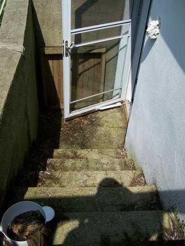 <p>Water used to flow down the stairs and into the basement of this Mamaroneck, NY home. However, after our team installed the TrenchDrain system, no water was able to go into the house. TrenchDrain resembles half of a basement drainage pipe, with a grated opening fitted snugly on top. The grate is flush or slightly below the floor, eliminating any tripping hazard.</p>