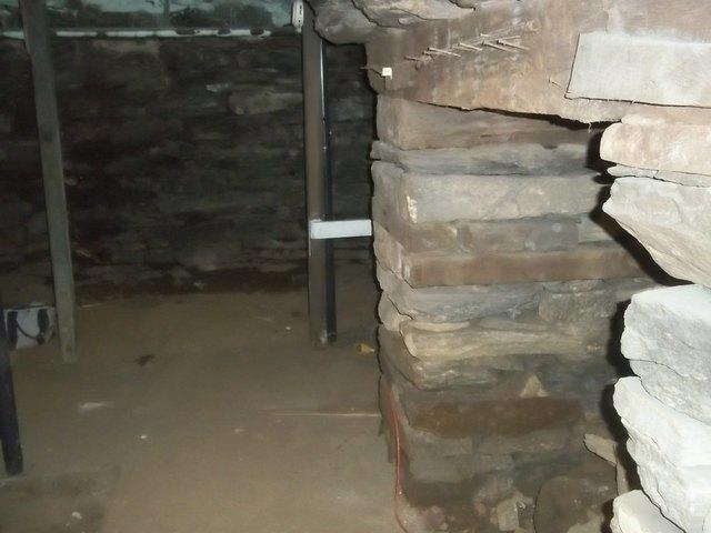 The Yantic, CT crawl space was almost completely unused by the homeowners due to its water problem. They could not store items because they were afraid of damage from the water. We installed our CleanSpace crawl space encapsulation system throughout the area to seal it off and keep it dry, making it a functional space for the home owners. 