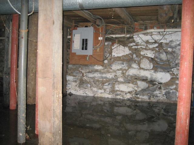 The basement of this Bantam, CT home was very flooded, with high levels of water. To combat heavy rains in the future, we installed our WaterGuard sub-floor perimeter drainage system. Our patented drains draw water out of the walls to prevent it from entering the basement, and they even work well with fieldstone foundations. The home is now protected against flooding, and it will stay dry for the homeowners to enjoy.