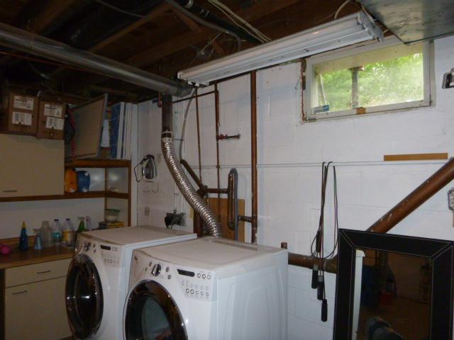 Before Finishing Laundry Area in Katonah, NY