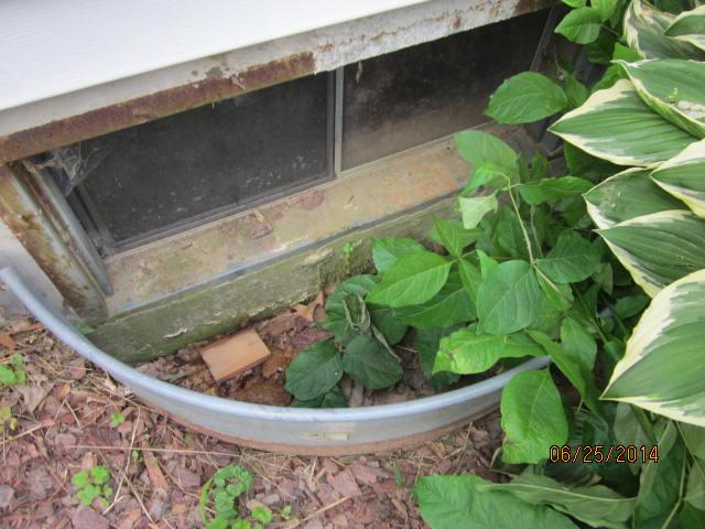 Window wells without covers, like this one, let in leaves and debris, and rain and gutter overflow water get in. The dirt bottom allows weeds to grow and mud to splash up onto your windows. All this makes for a pretty lousy view from inside the basement - the space you want to improve. Our light-colored SunHouse window well features a sturdy, clear cover that fits nicely and a bottom that prevents weed growth as well as keeps leaves, debris, and rain out.