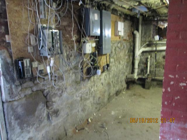 View of an interior wall in basement before BrightWall