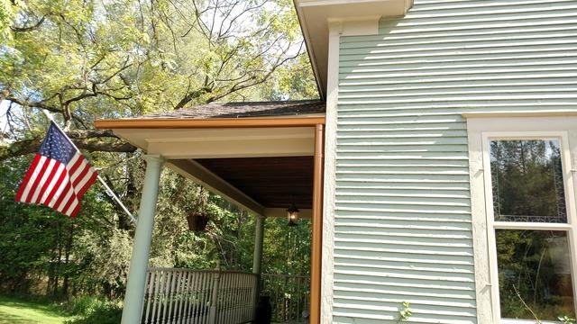 part of the home with copper gutter